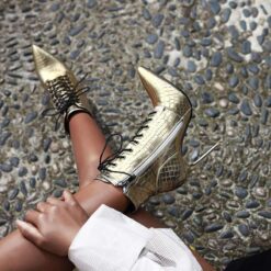 bottines talon effet croco dore mannequin