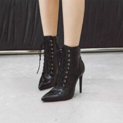 bottines à talon effet croco noir modele