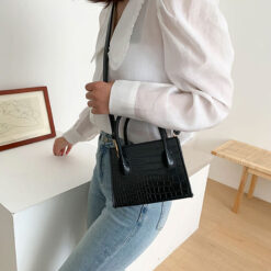 marque de sac croco noir bandoulière