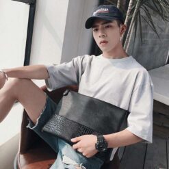 pochette noir croco mannequin