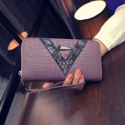 portefeuille croco femme rose