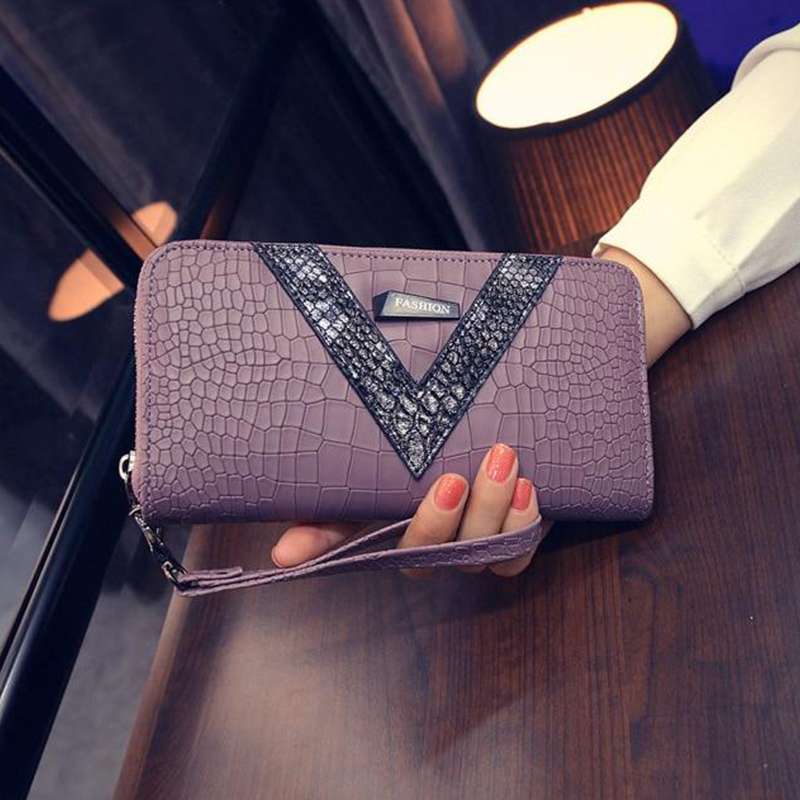 portefeuille croco femme rose