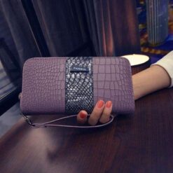 portefeuille crocodile femme rose