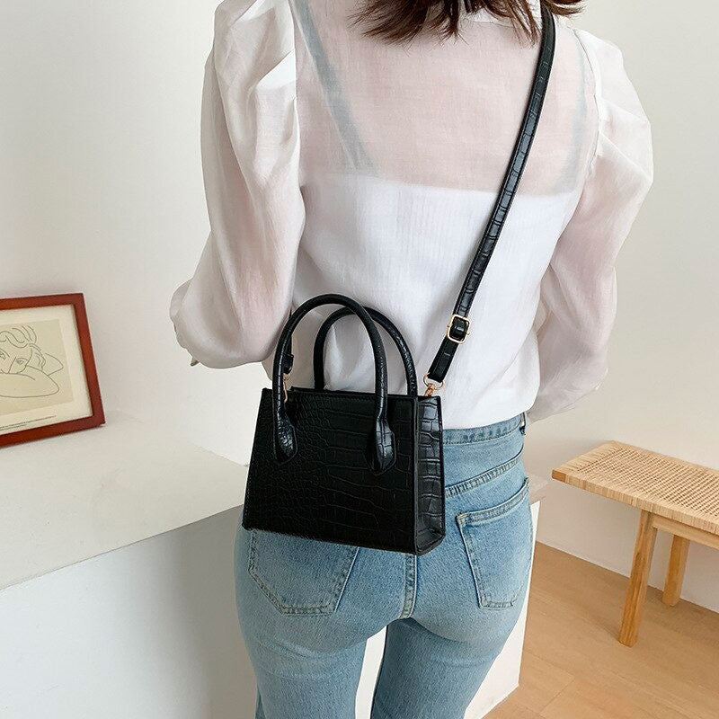 sac croco noir bandoulière de marque