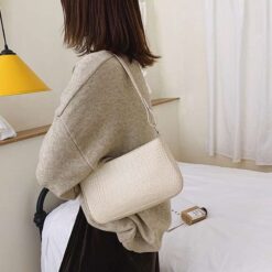 sac à main croco noir ivoire