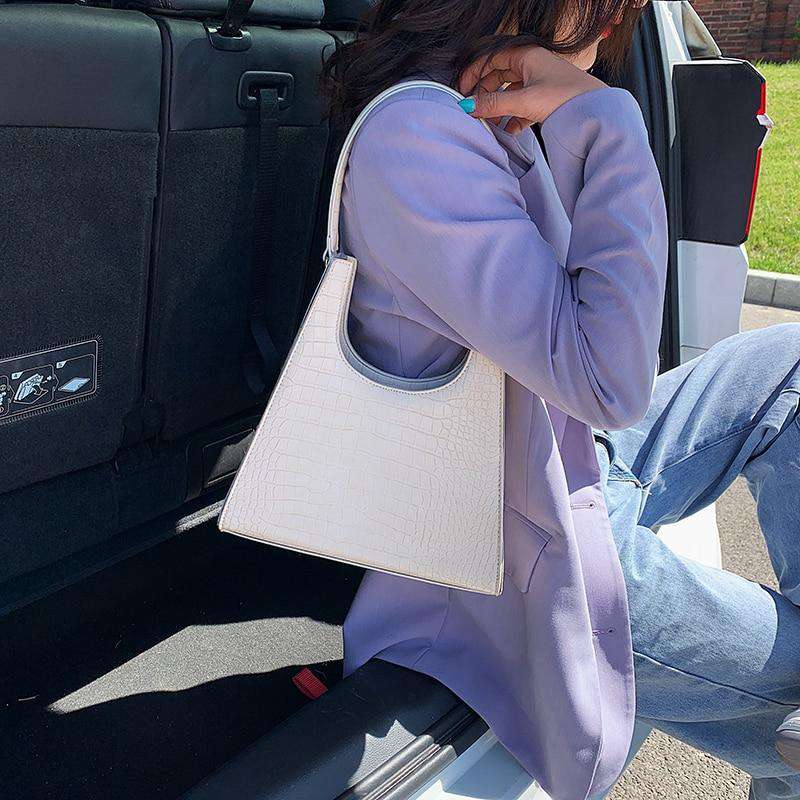 sac à main façon croco blanc