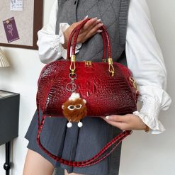 sac à main croco bordeaux