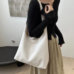 sac à main crocodile blanc