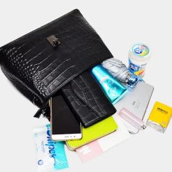 sac à main cuir alligator noir