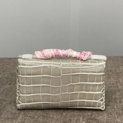 sac à main motif alligator