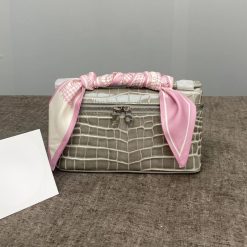 sac à main motif croco