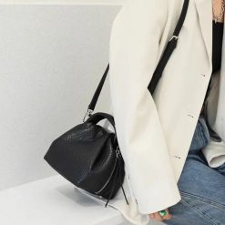 sac à main noir crocodile pour femme
