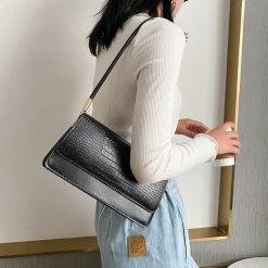 sac baguette croco noir