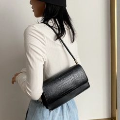 sac baguette crocodile noir