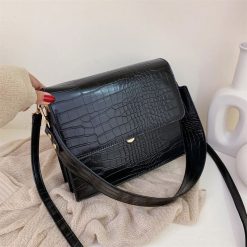 sac bandoulière croco noir pour femme
